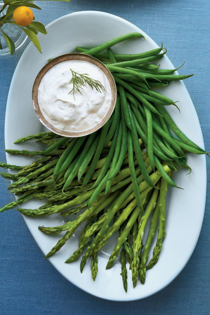 Escaparate the first signs of springs with tender spears of asparagus and haricots verts serving as crudites for this creamy fresh herb dip.