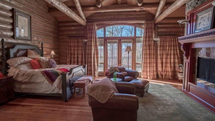 ние imagine it would not be hard to unwind in this gorgeous bedroom complete with a fireplace and private outdoor space. And there are plenty of other bedrooms to choose from as well if someone else snags this one first!