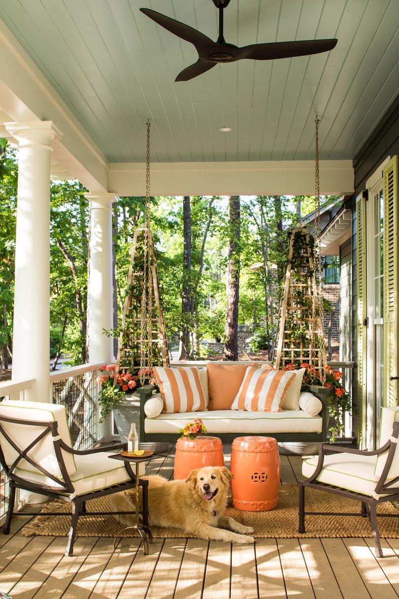 Side Porch with Swing and Orange Accents
