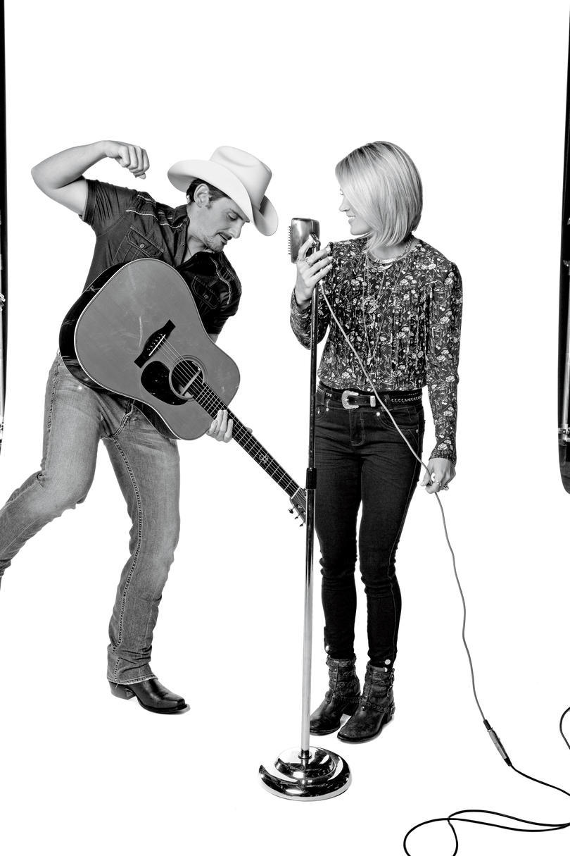Brad with Guitar and Carrie with Microphone