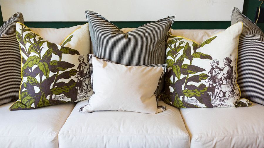 أبيض couch with Floral Pillows