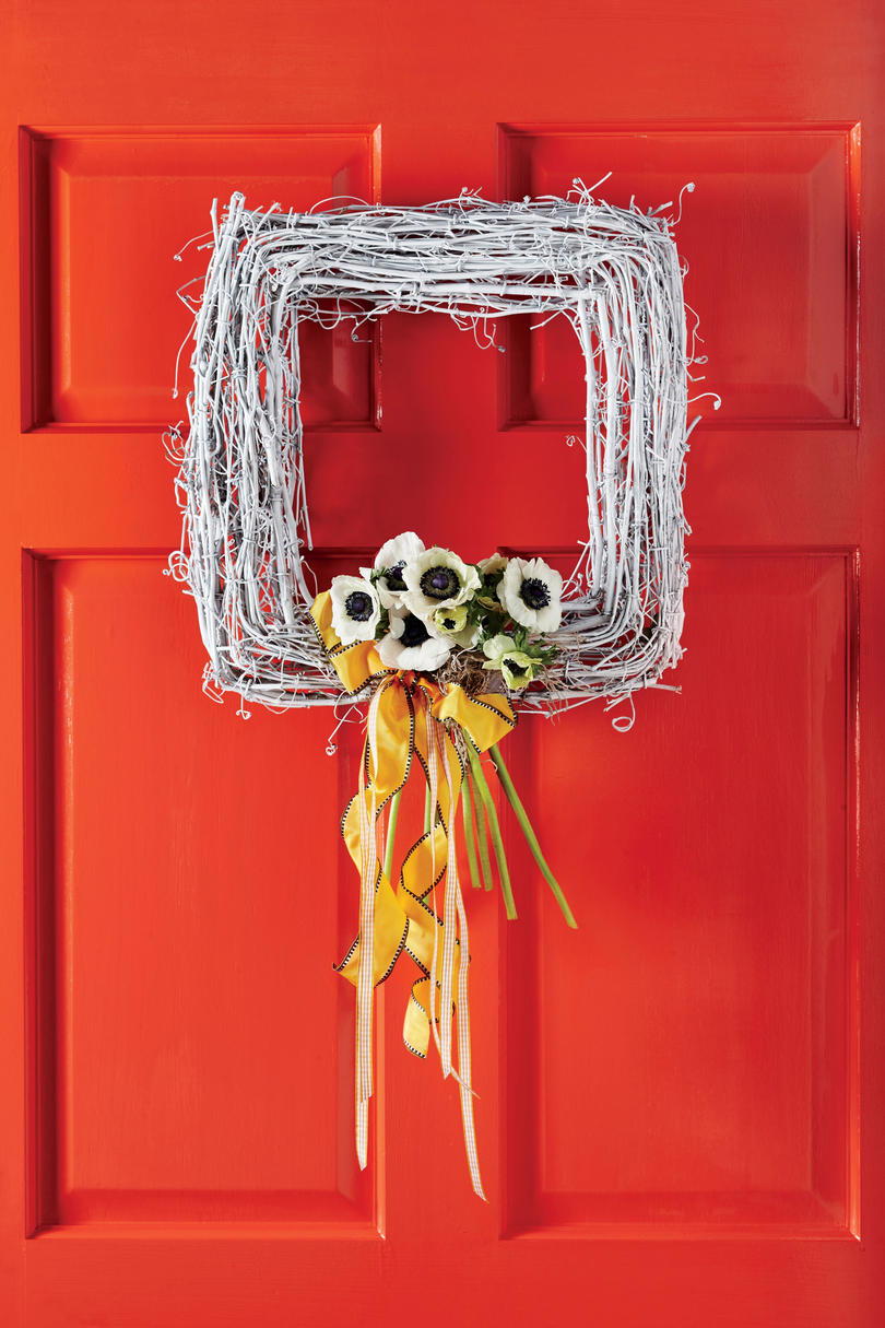 أحمر Door with White Square Wreath and Flowers