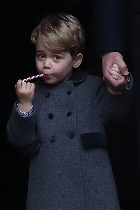私たち Prince Charming! 15 Adorable Photos of George Eating Candy Cane After Christmas Church